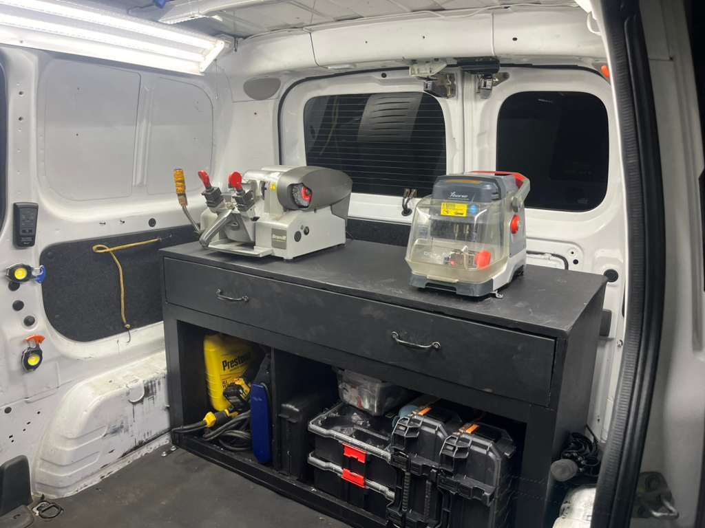 Equipped mobile automotive locksmith work van